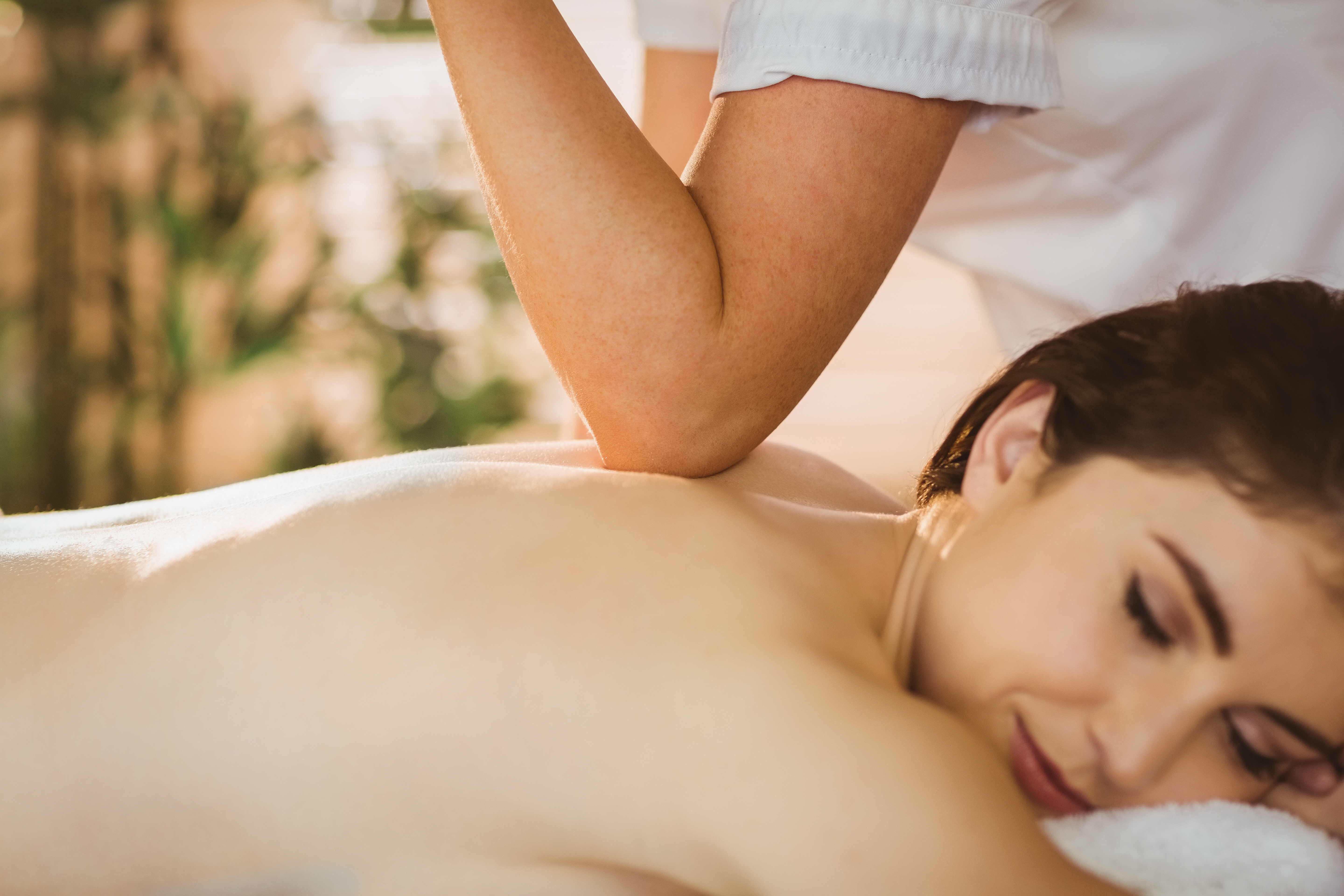 A woman receiving a massage.